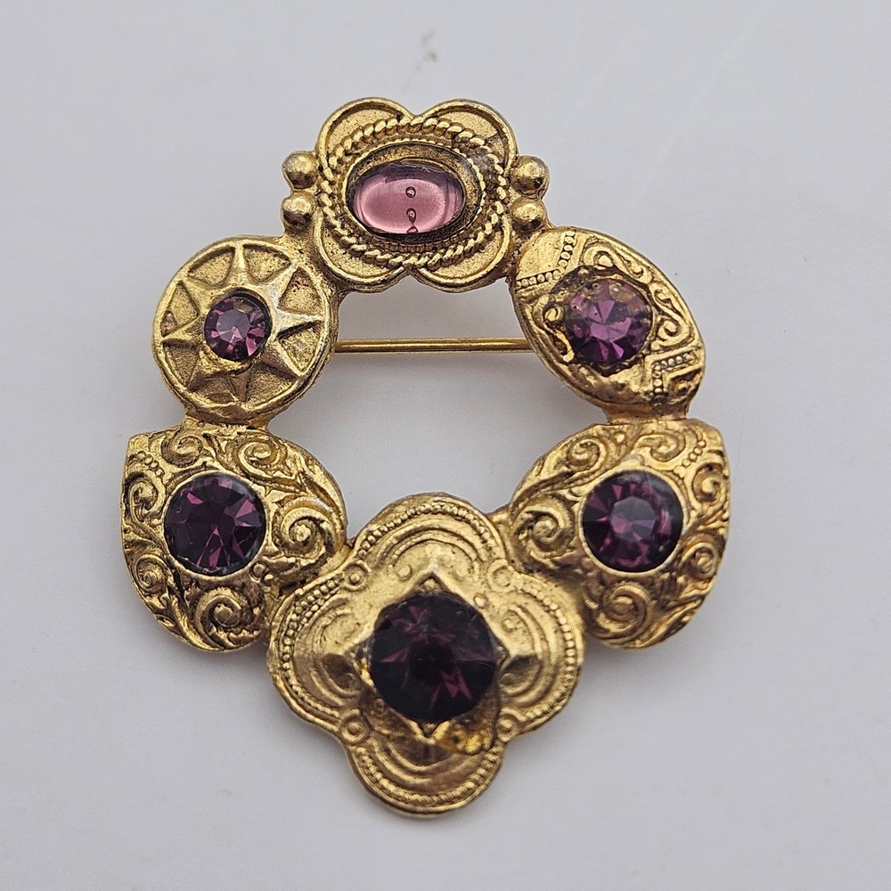 Vintage Gold Tone Purple Rhinestone Wreath Brooch Ornate Filigree Circle Pin